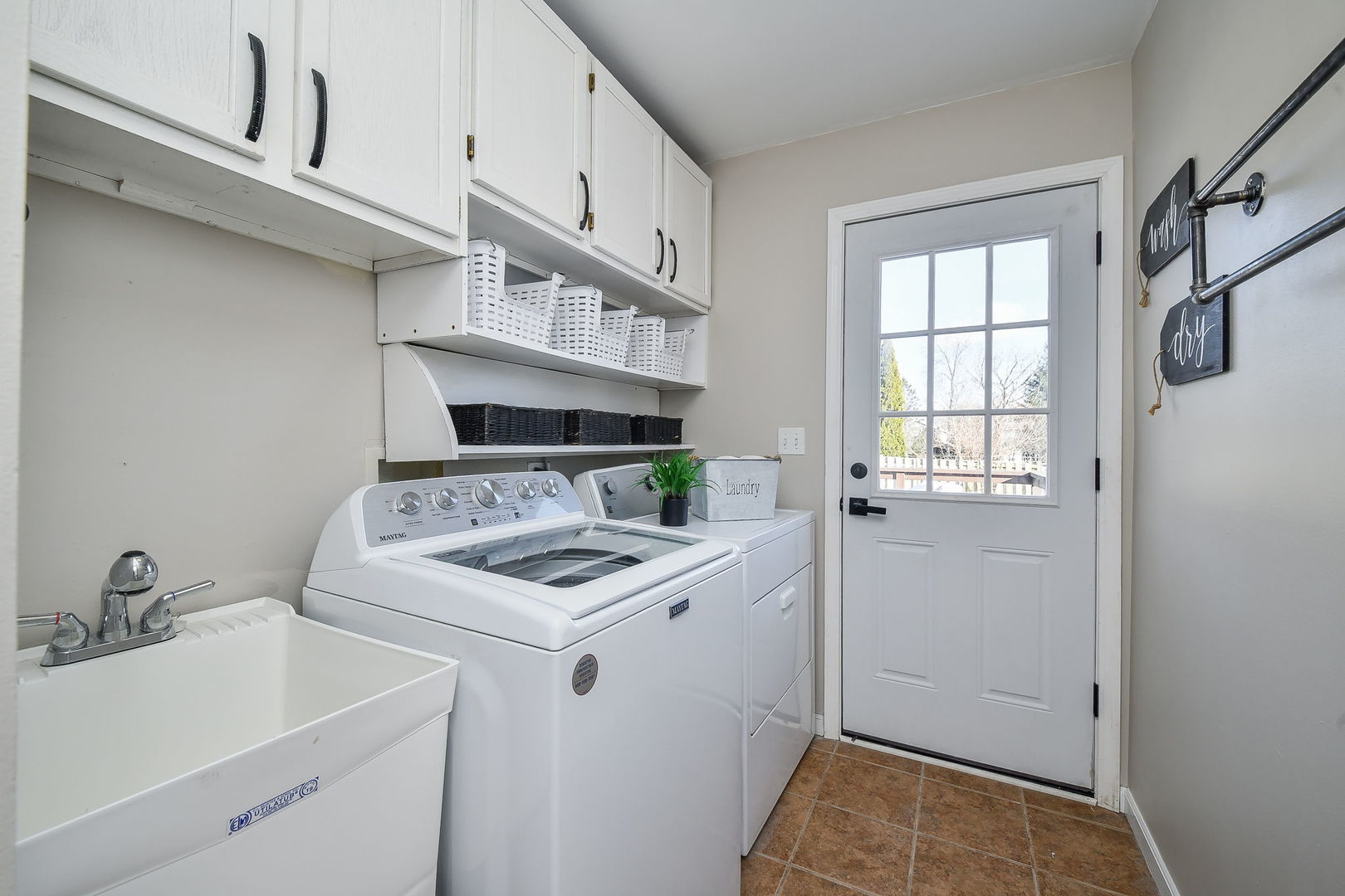 1206 Beckman Lane Batavia, IL 60510 - Photo 32 of 42 a utility room with cabinets washer and dryer