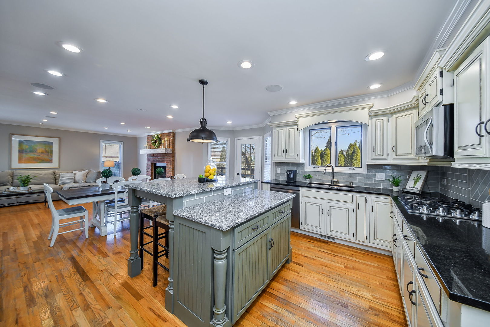 1206 Beckman Lane Batavia, IL 60510 - Photo 6 of 42 a kitchen with stainless steel appliances granite countertop sink stove top oven and cabinets