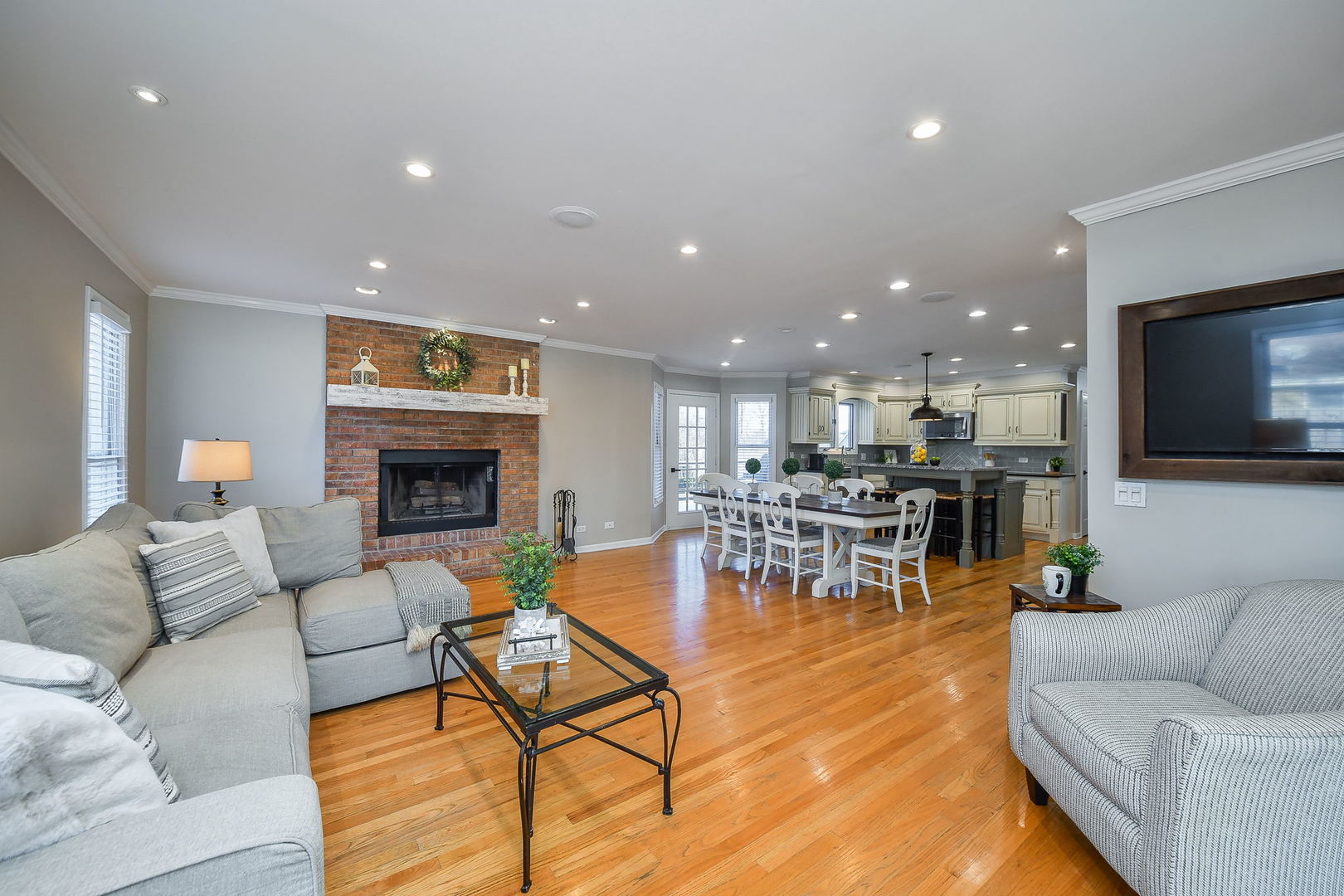 1206 Beckman Lane Batavia, IL 60510 - Photo 7 of 42 a living room with furniture and a fireplace