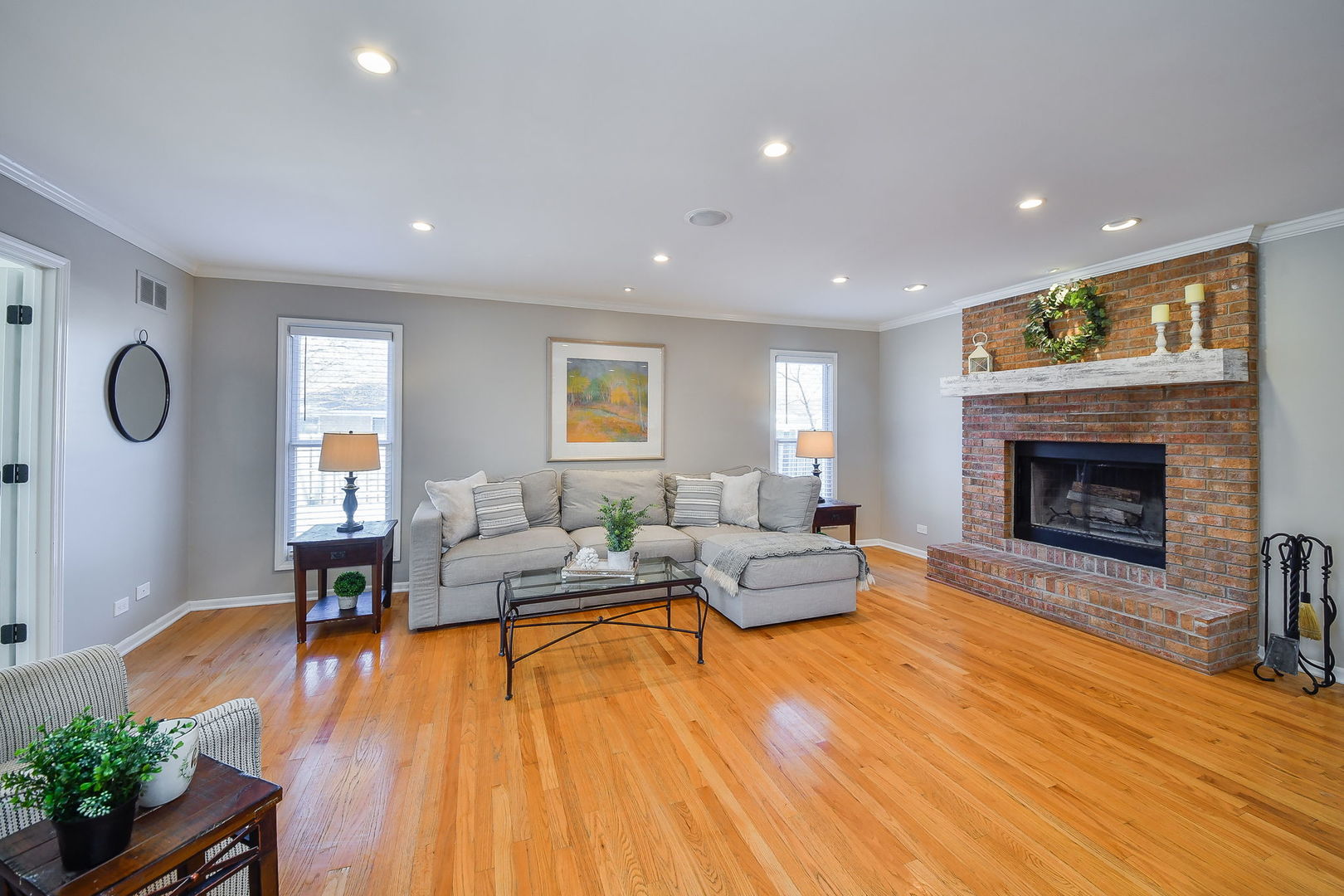 1206 Beckman Lane Batavia, IL 60510 - Photo 8 of 42 a living room with furniture and a fireplace