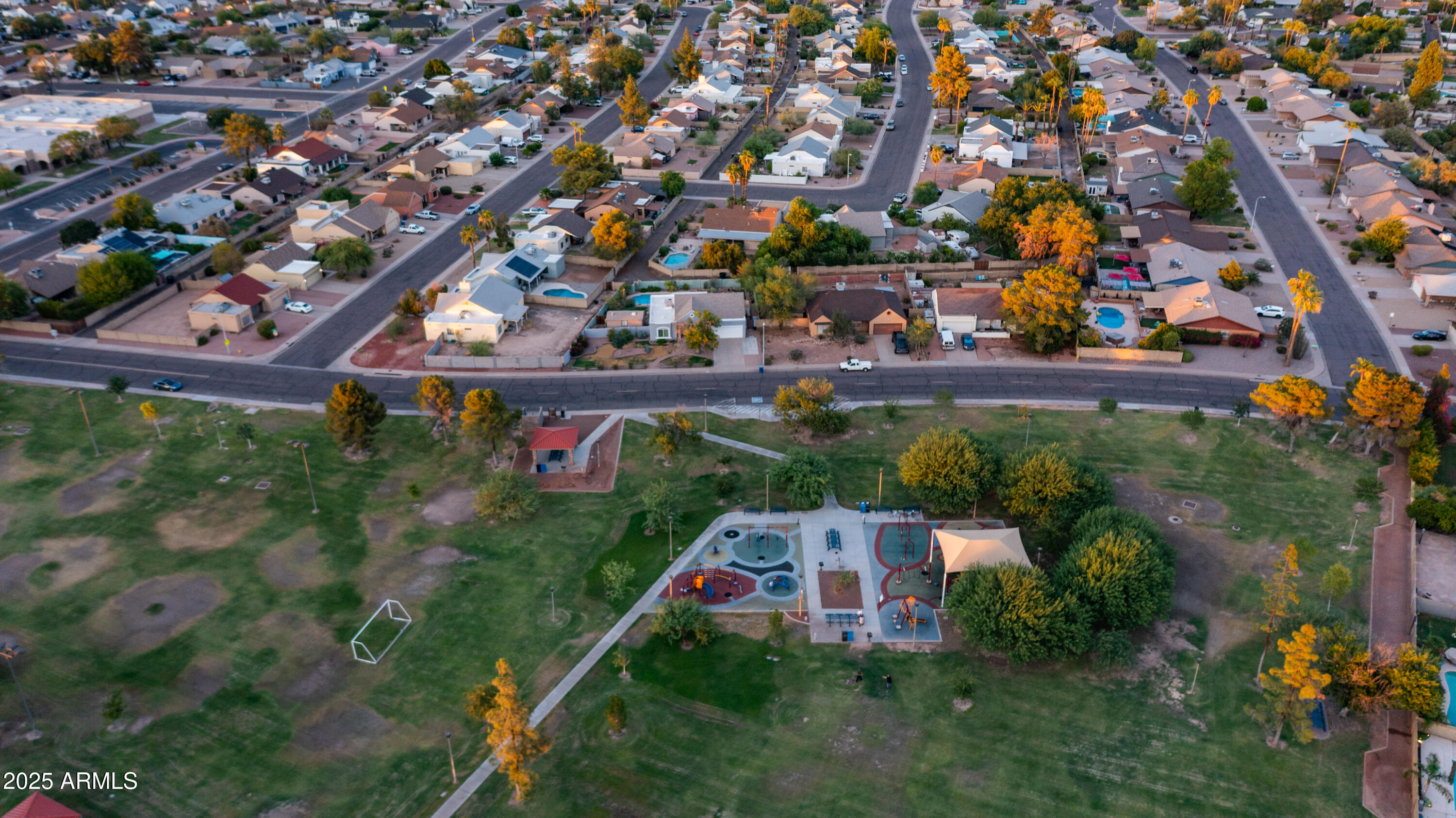 7467 South Rita Lane Tempe, AZ 85283 - Photo 102 of 111 an aerial view of a house with a yard and garden