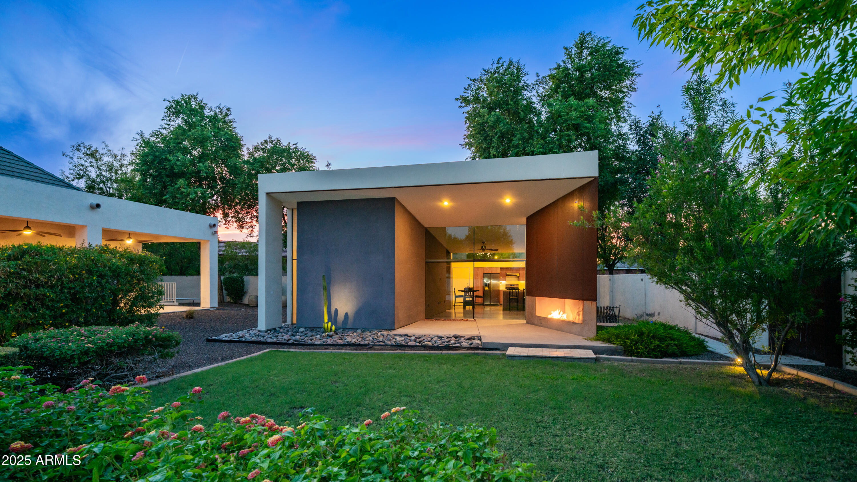 7467 South Rita Lane Tempe, AZ 85283 - Photo 22 of 111 a view of a backyard with plants and a patio