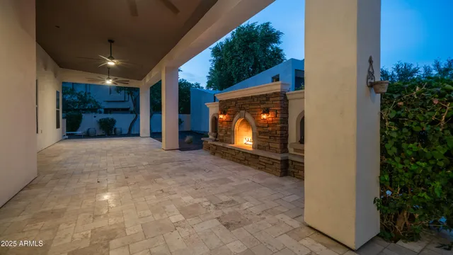 an empty room with windows and outdoor view