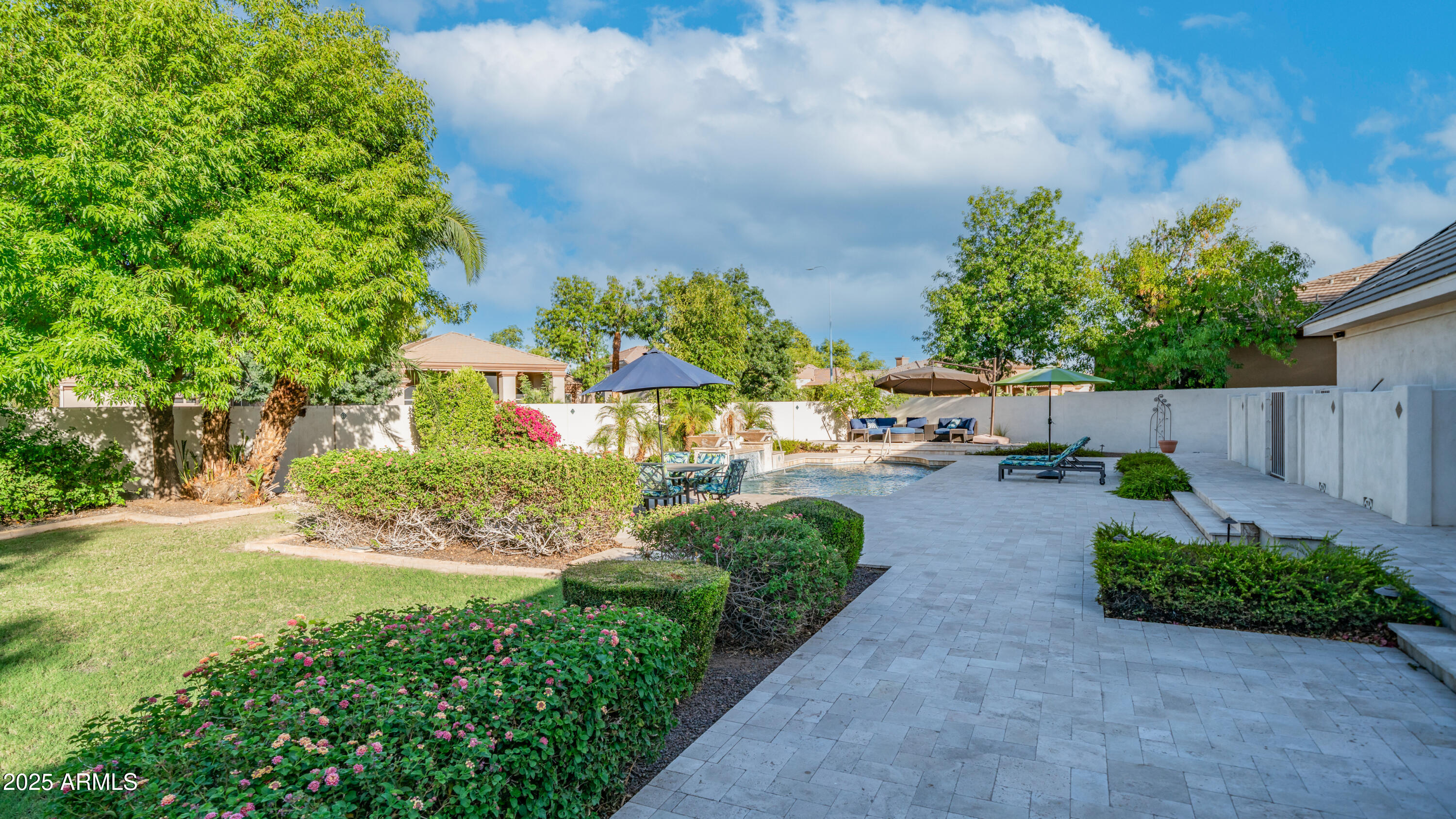 7467 South Rita Lane Tempe, AZ 85283 - Photo 27 of 111 a view of a garden with houses