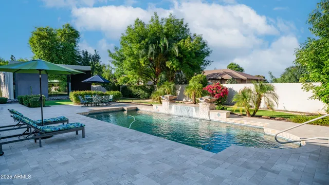 a utility room with a sink washer and dryer
