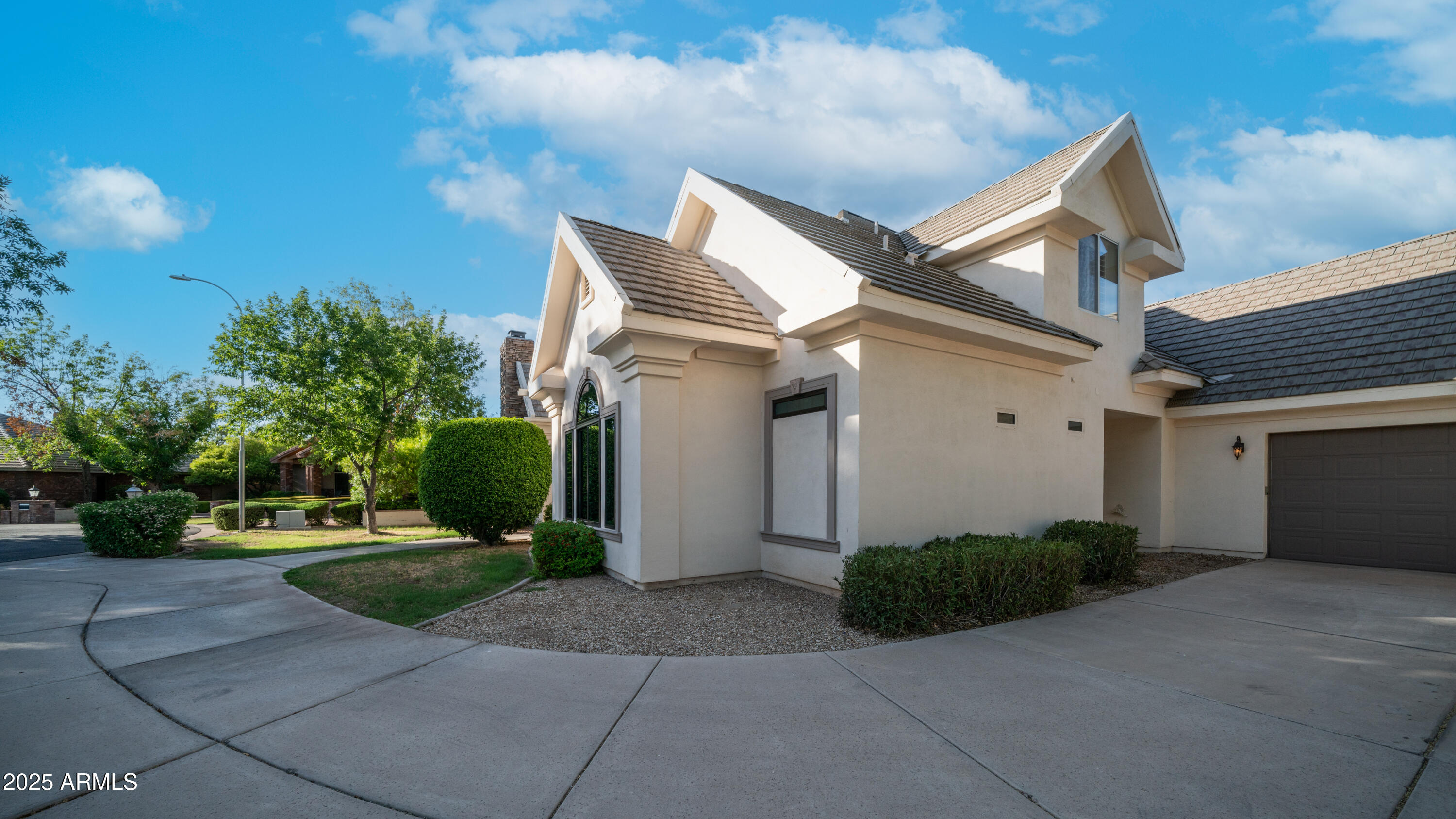 7467 South Rita Lane Tempe, AZ 85283 - Photo 32 of 111 a view of a house with backyard and trees
