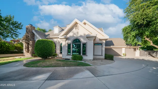 a view of a back yard with green space