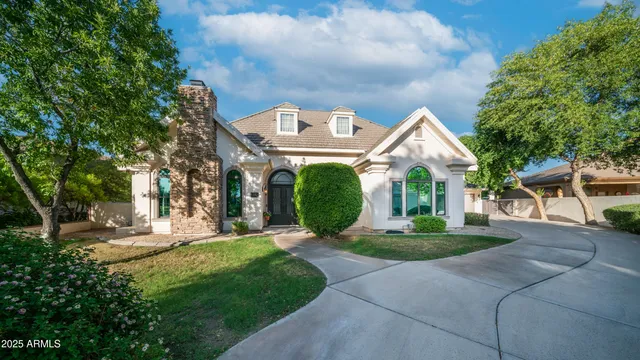 a view of a livingroom with furniture and a window