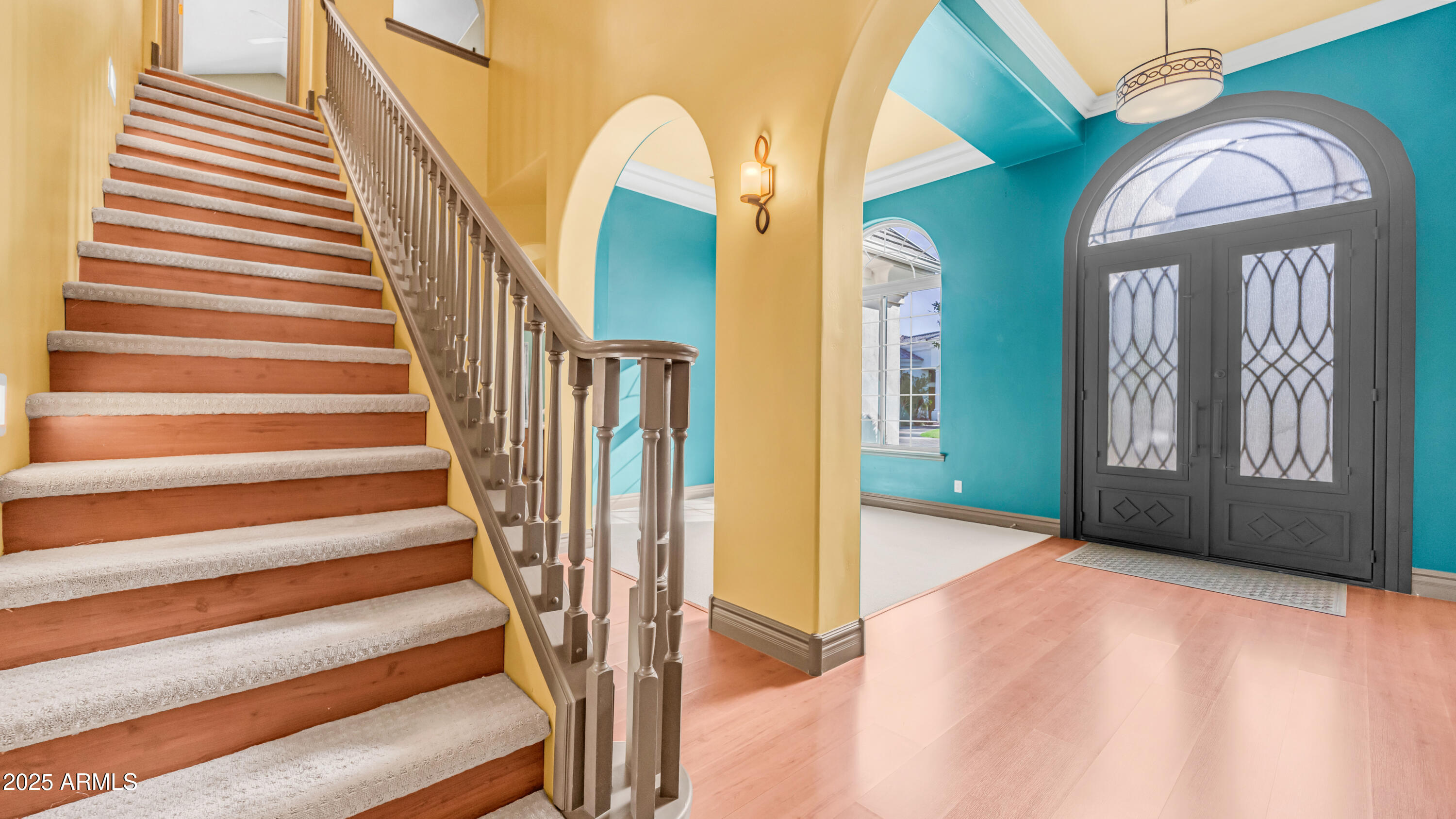 7467 South Rita Lane Tempe, AZ 85283 - Photo 37 of 111 a view of entryway and hall with wooden floor