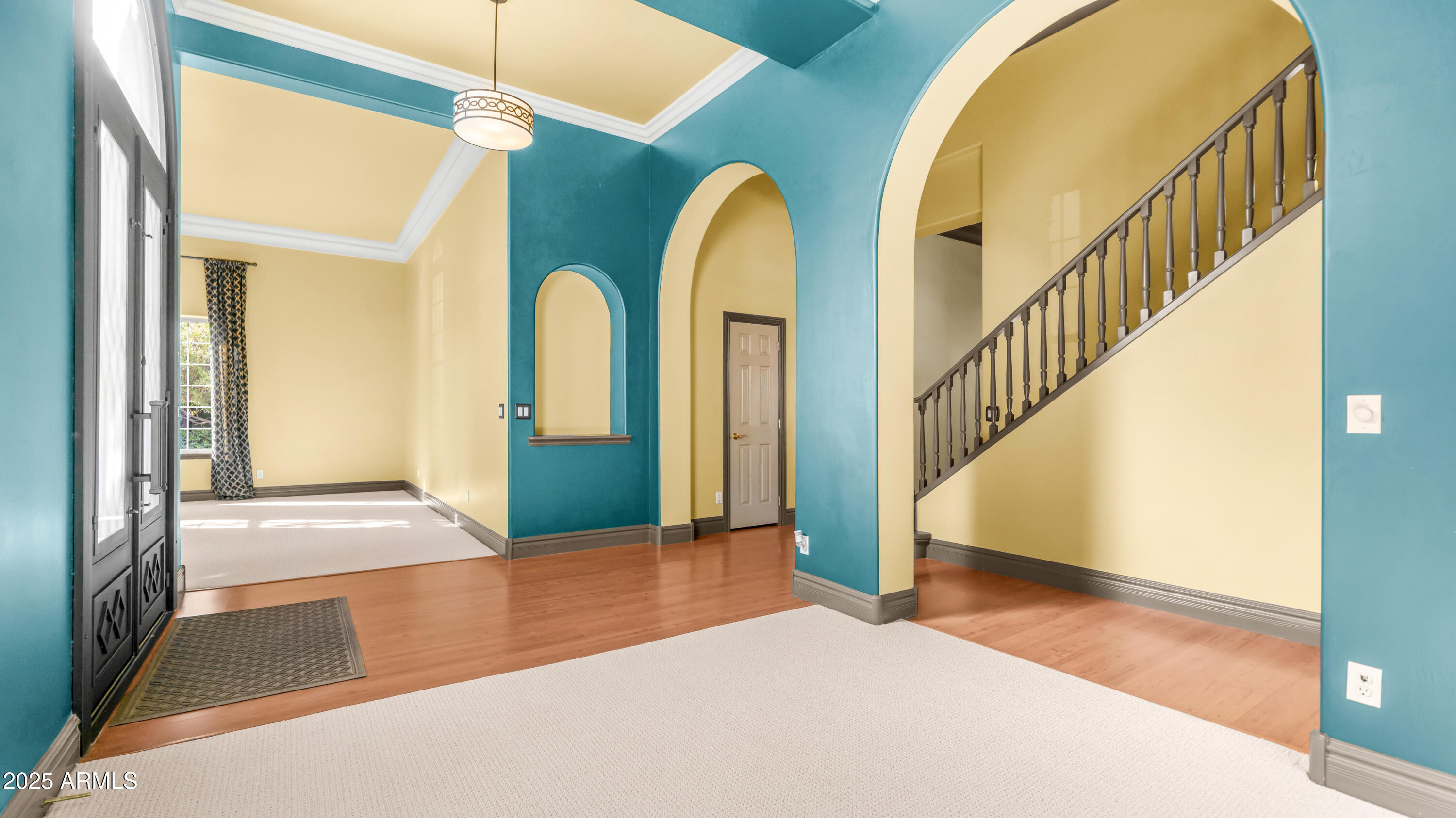 7467 South Rita Lane Tempe, AZ 85283 - Photo 39 of 111 a view of a hallway with wooden floor and entryway