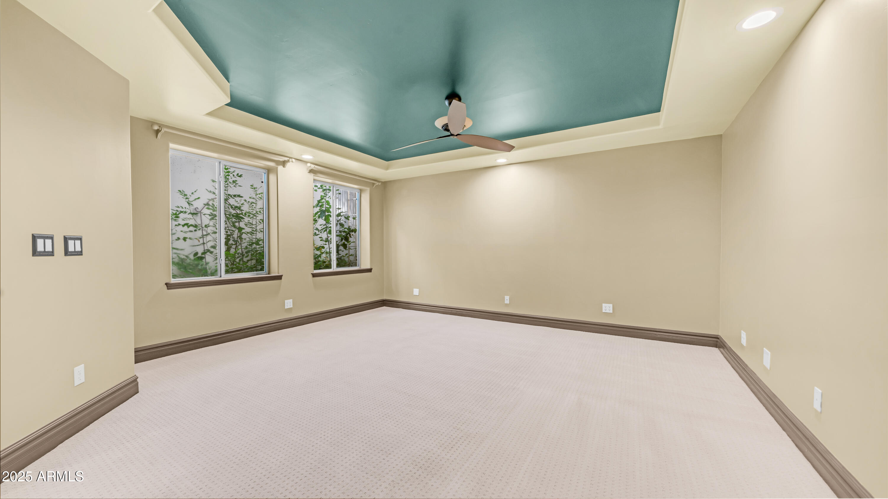 7467 South Rita Lane Tempe, AZ 85283 - Photo 50 of 111 an empty room with windows and outdoor view