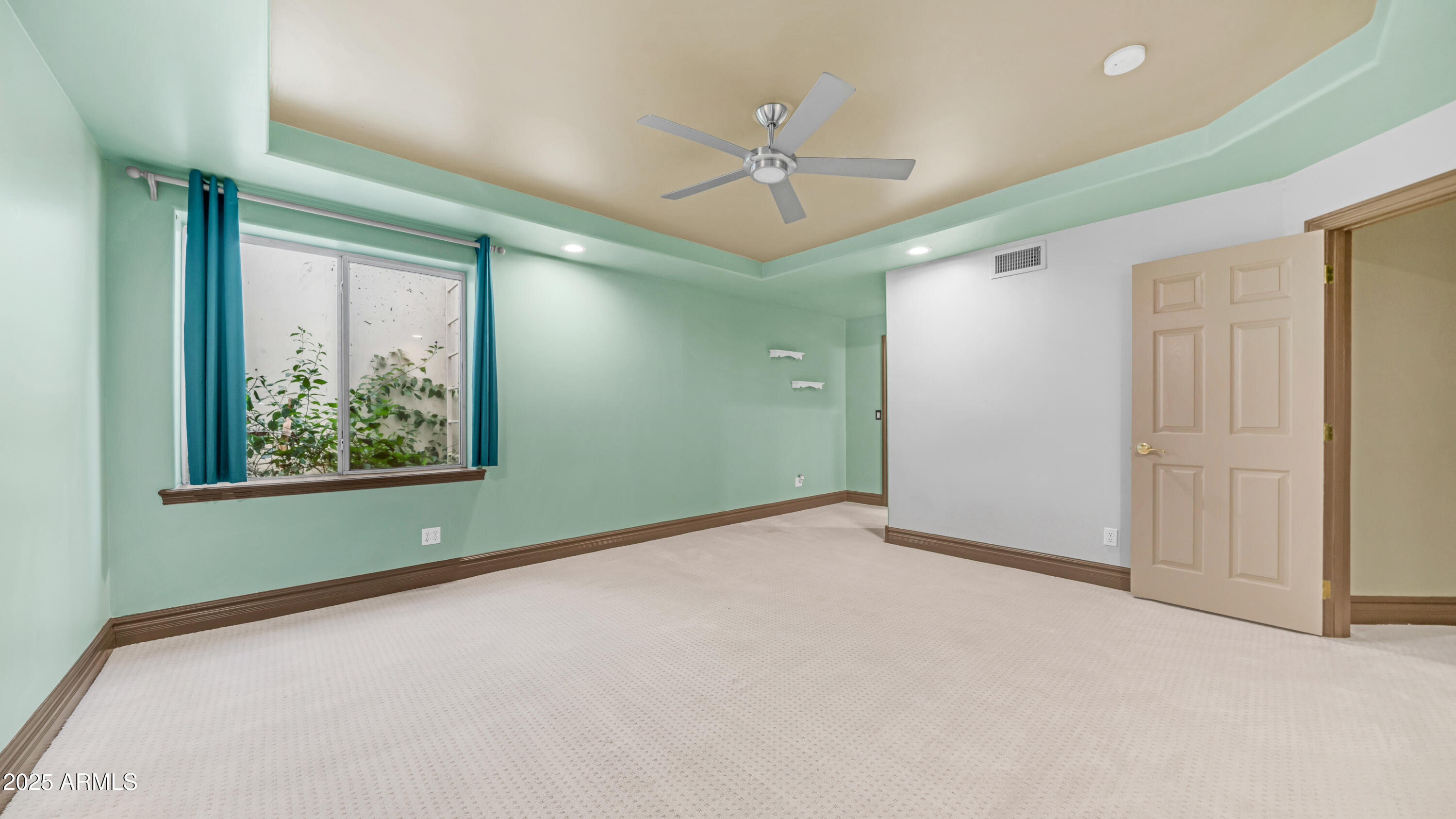 7467 South Rita Lane Tempe, AZ 85283 - Photo 57 of 111 a view of an empty room with a window