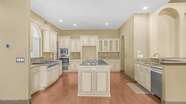 a view of a swimming pool with chairs