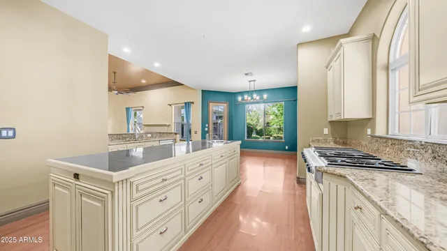 a view of a house with backyard and garden