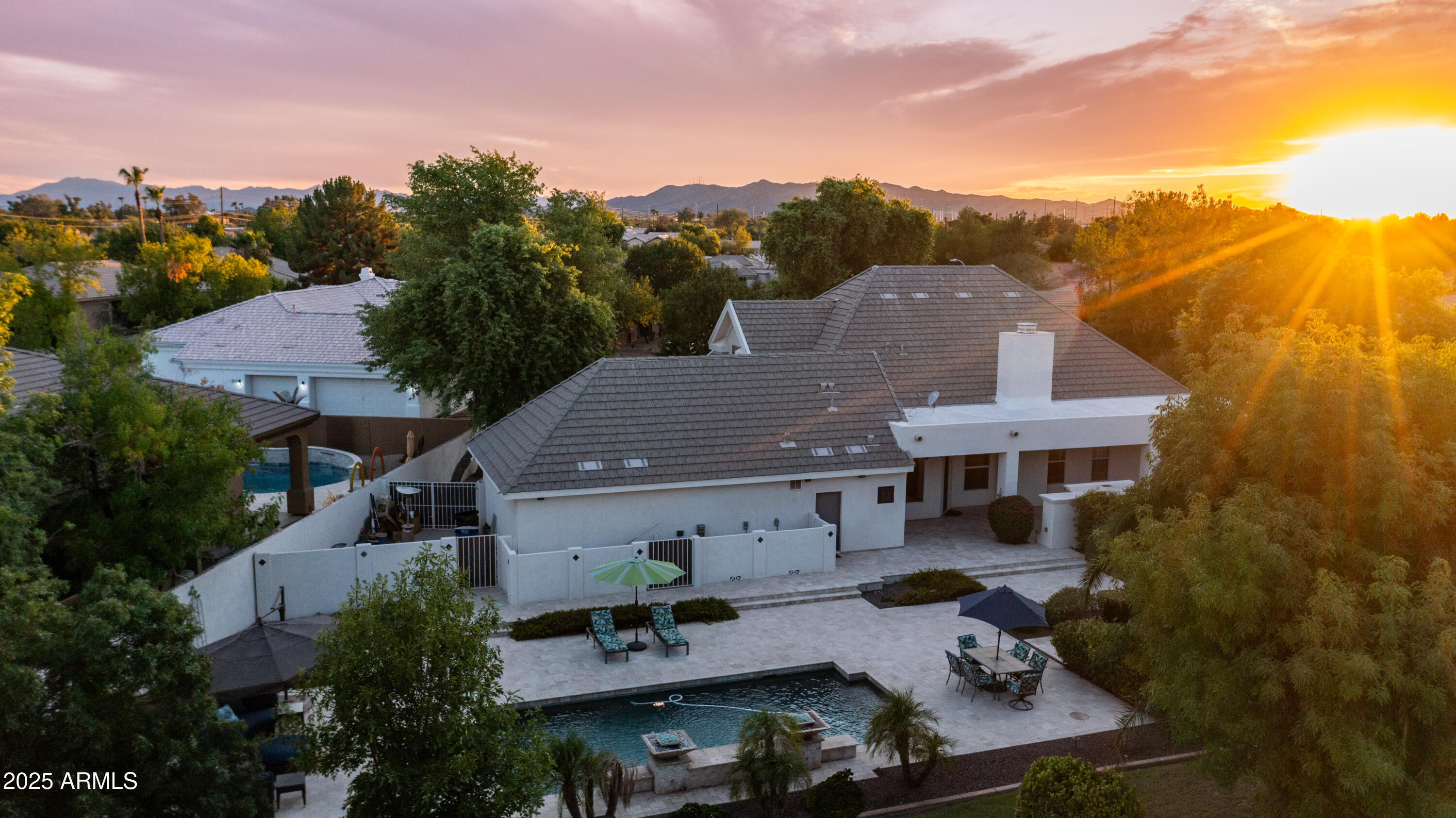 7467 South Rita Lane Tempe, AZ 85283 - Photo 100 of 111 an aerial view of multiple houses with a yard