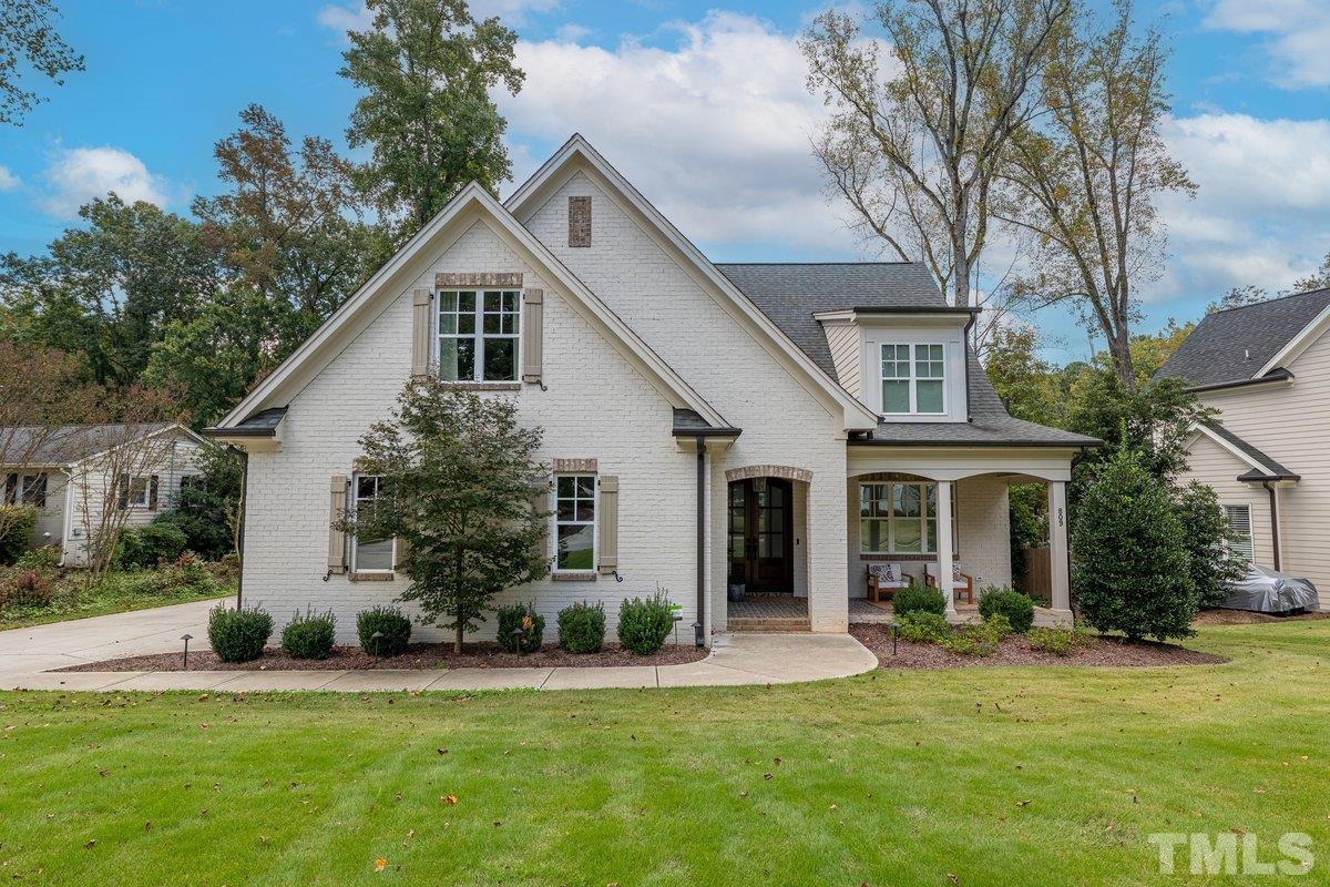 809 Macon Place Raleigh, NC 27609 - Photo 1 of 3 a front view of house with yard and green space