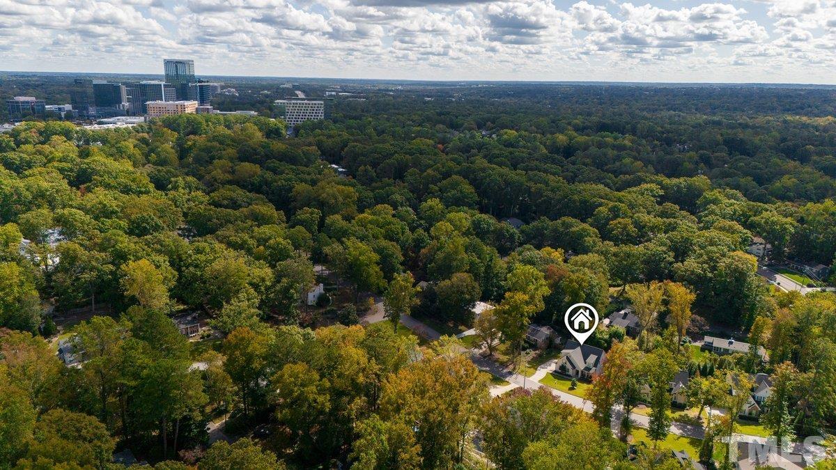 809 Macon Place Raleigh, NC 27609 - Photo 2 of 3 a view of a bunch of trees and bushes