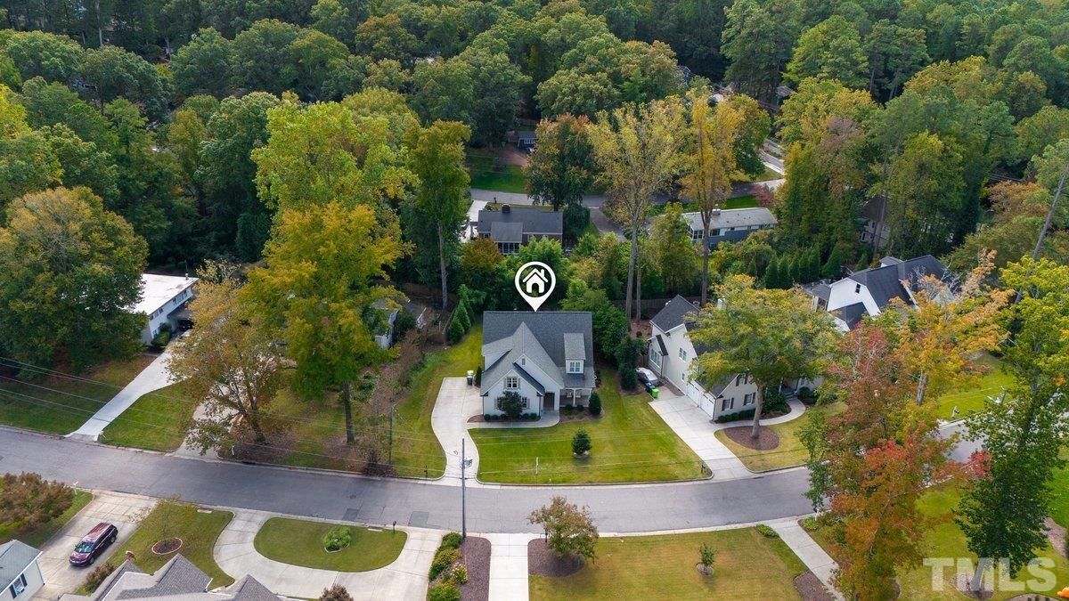 809 Macon Place Raleigh, NC 27609 - Photo 3 of 3 an aerial view of house with yard swimming pool and outdoor seating