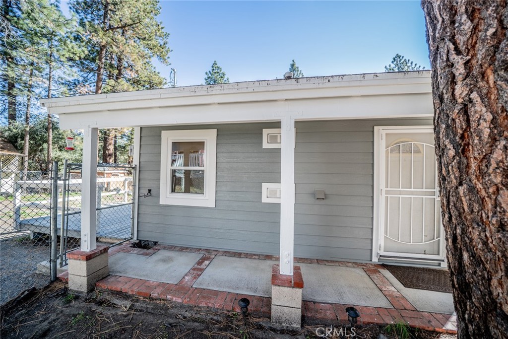 1724 Thrush Road Wrightwood, CA 92397 - Photo 2 of 39 a view of a house with a small yard