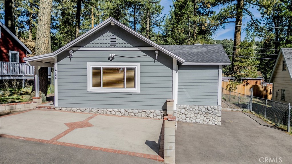 1724 Thrush Road Wrightwood, CA 92397 - Photo 22 of 39 a front view of a house with yard