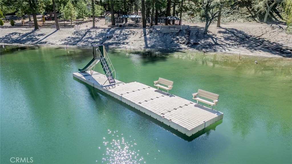 1724 Thrush Road Wrightwood, CA 92397 - Photo 31 of 39 a view of a lake with chairs