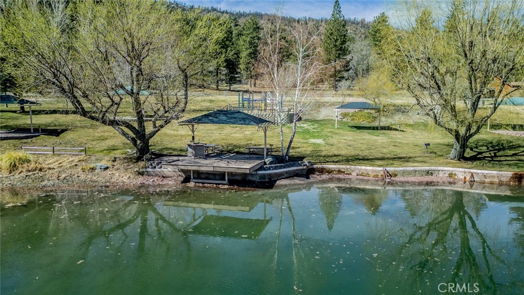 1724 Thrush Road Wrightwood, CA 92397 - Photo 32 of 39 a swimming pool with outdoor seating and yard