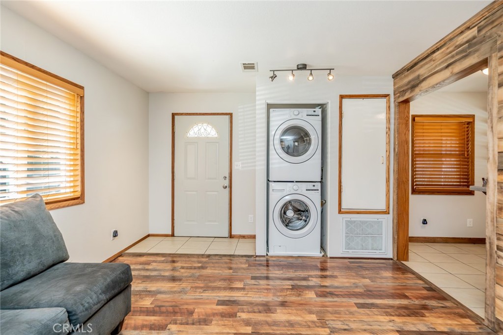 1724 Thrush Road Wrightwood, CA 92397 - Photo 7 of 39 a view of a livingroom with washer and dryer