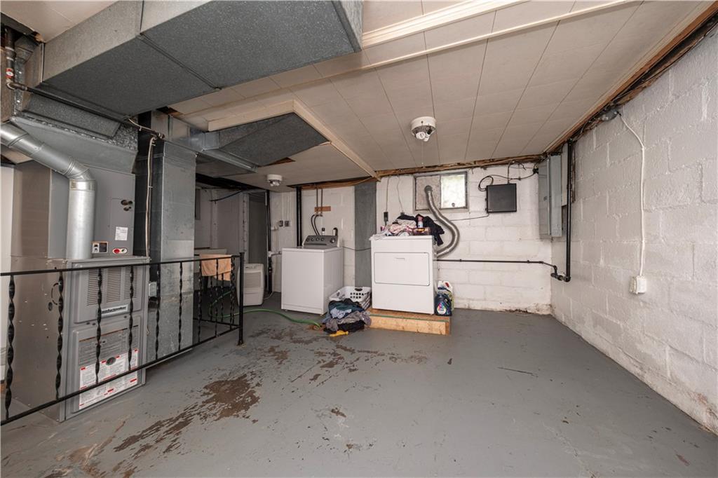 44 Forest Grove Road Coraopolis, PA 15108 - Photo 18 of 29 a view of a room with gym equipment