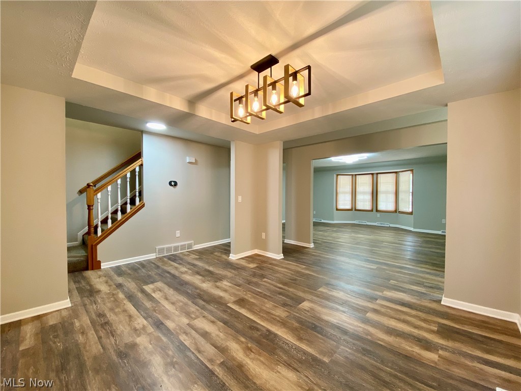 4407 Archer Road Cleveland, OH 44105 - Photo 2 of 34 Dining room with LVP (life warranty) & updated lighting