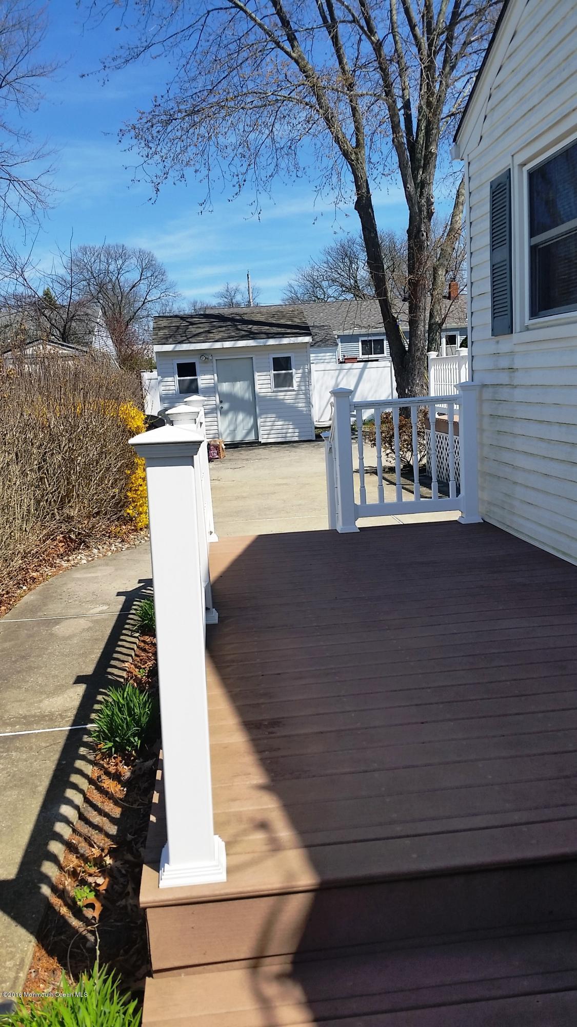 75 Nottingham Drive Brick, NJ 08724 - Photo 25 of 33 door off laundry room with deck