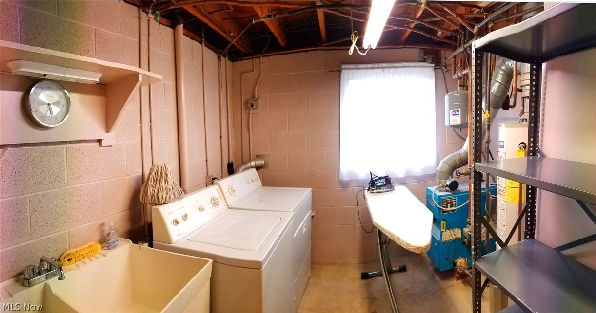 2888 Pressler Road Uniontown, OH 44685 - Photo 18 of 26 Washer and Dryer will stay. Also clean heating system with boiler and hot water heat.