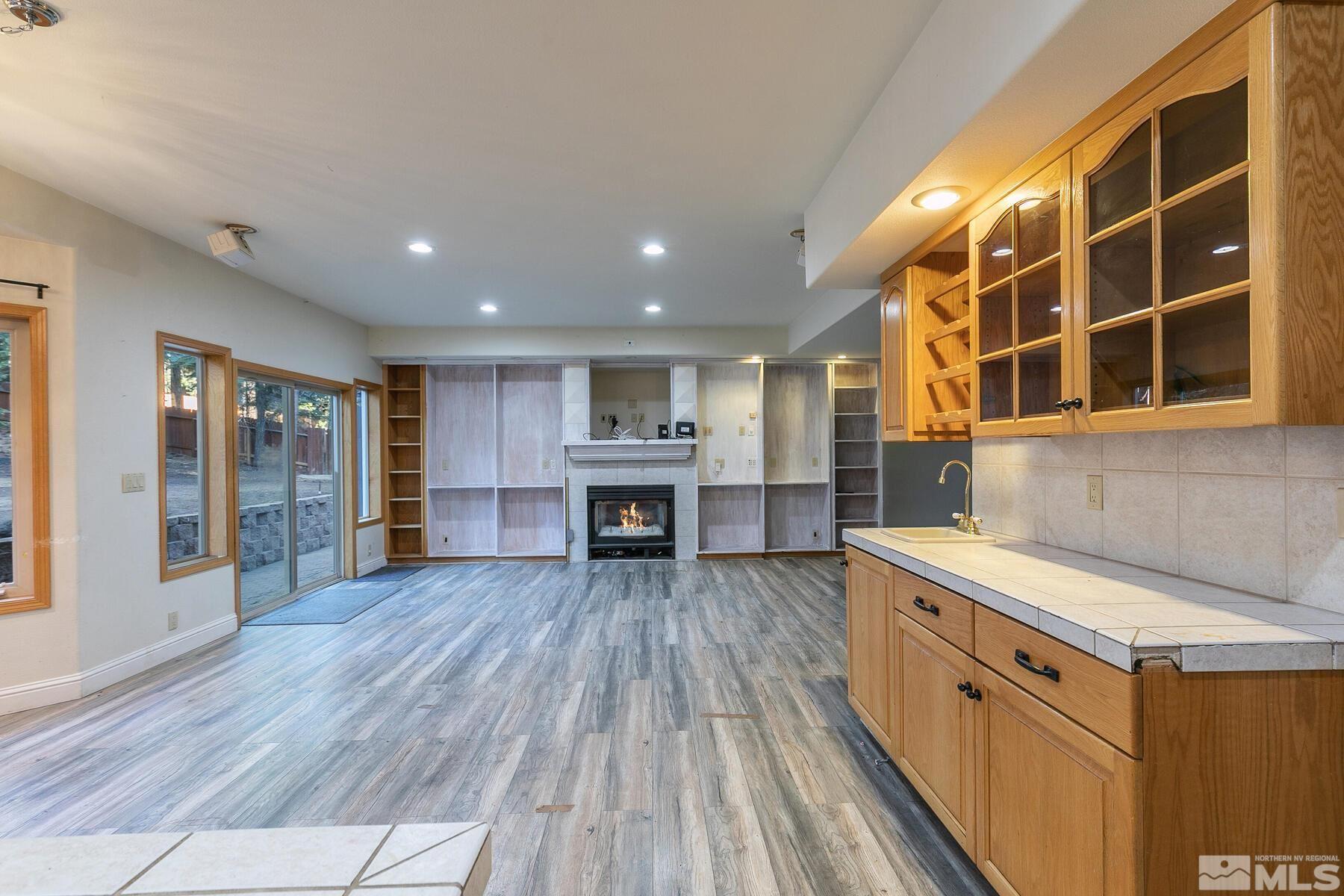 119 Meadow Drive Stateline, NV 89449 - Photo 16 of 30 a view of kitchen with granite countertop cabinets and wooden floor