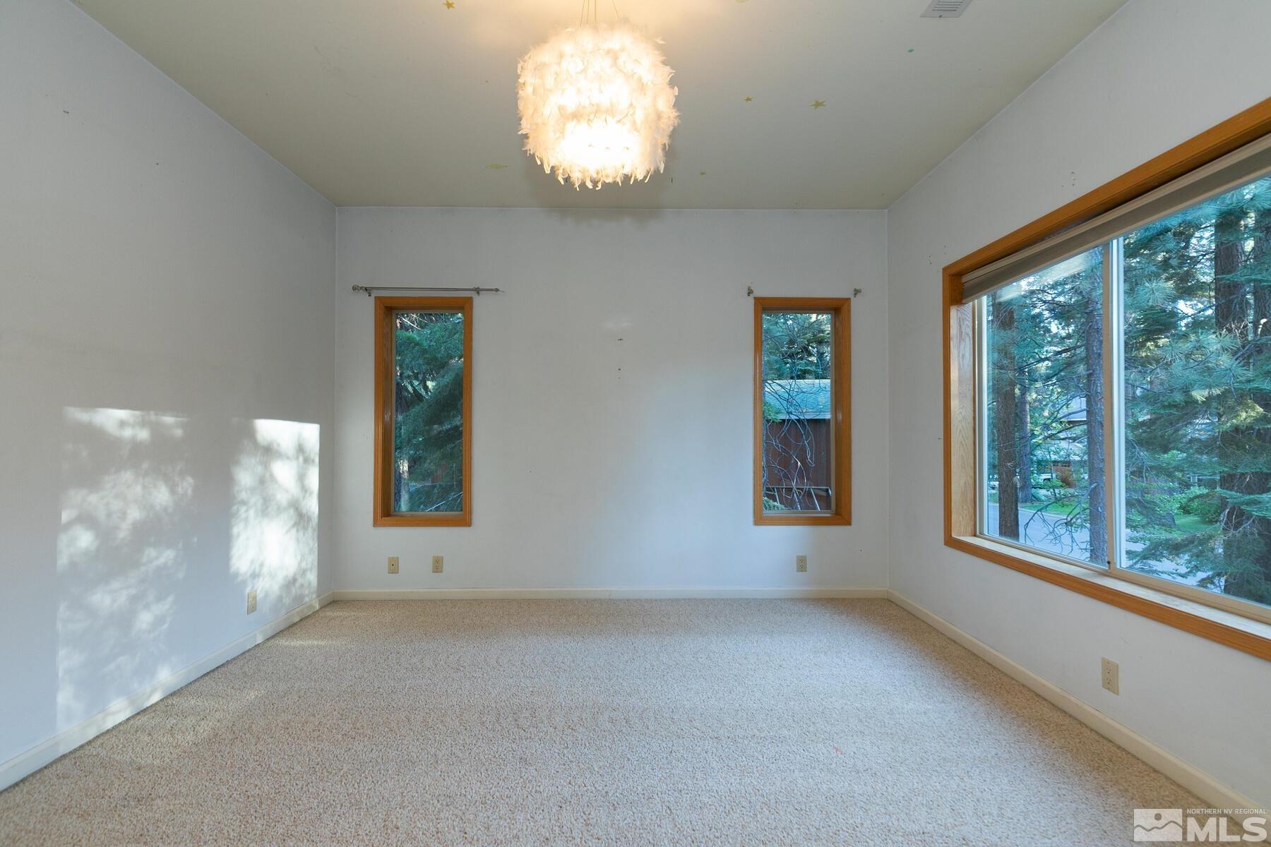 119 Meadow Drive Stateline, NV 89449 - Photo 21 of 30 a view of an empty room with a window