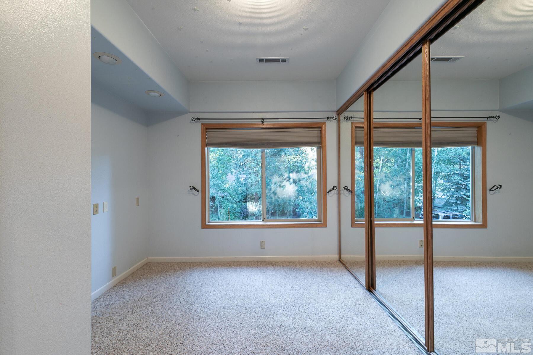 119 Meadow Drive Stateline, NV 89449 - Photo 25 of 30 an empty room with windows