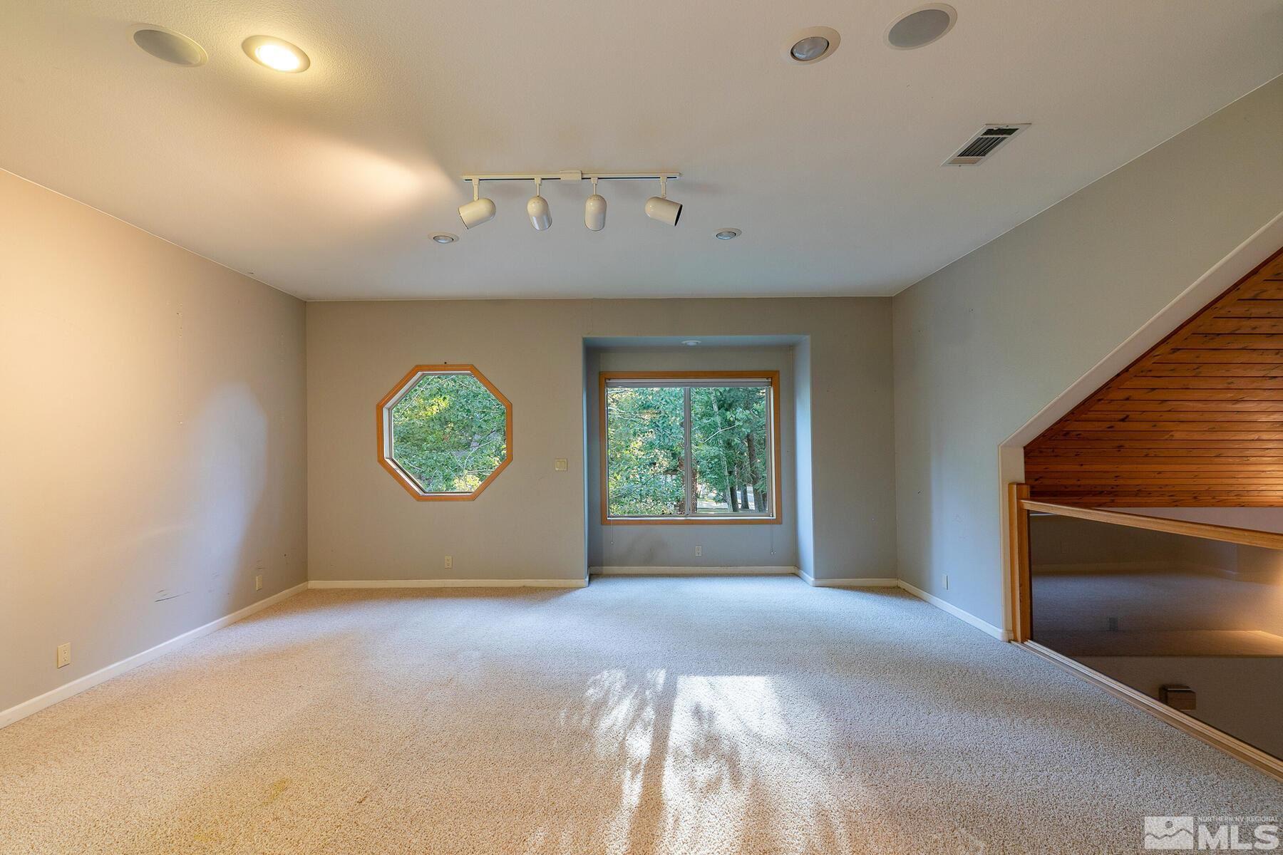 119 Meadow Drive Stateline, NV 89449 - Photo 27 of 30 a view of an empty room with a window
