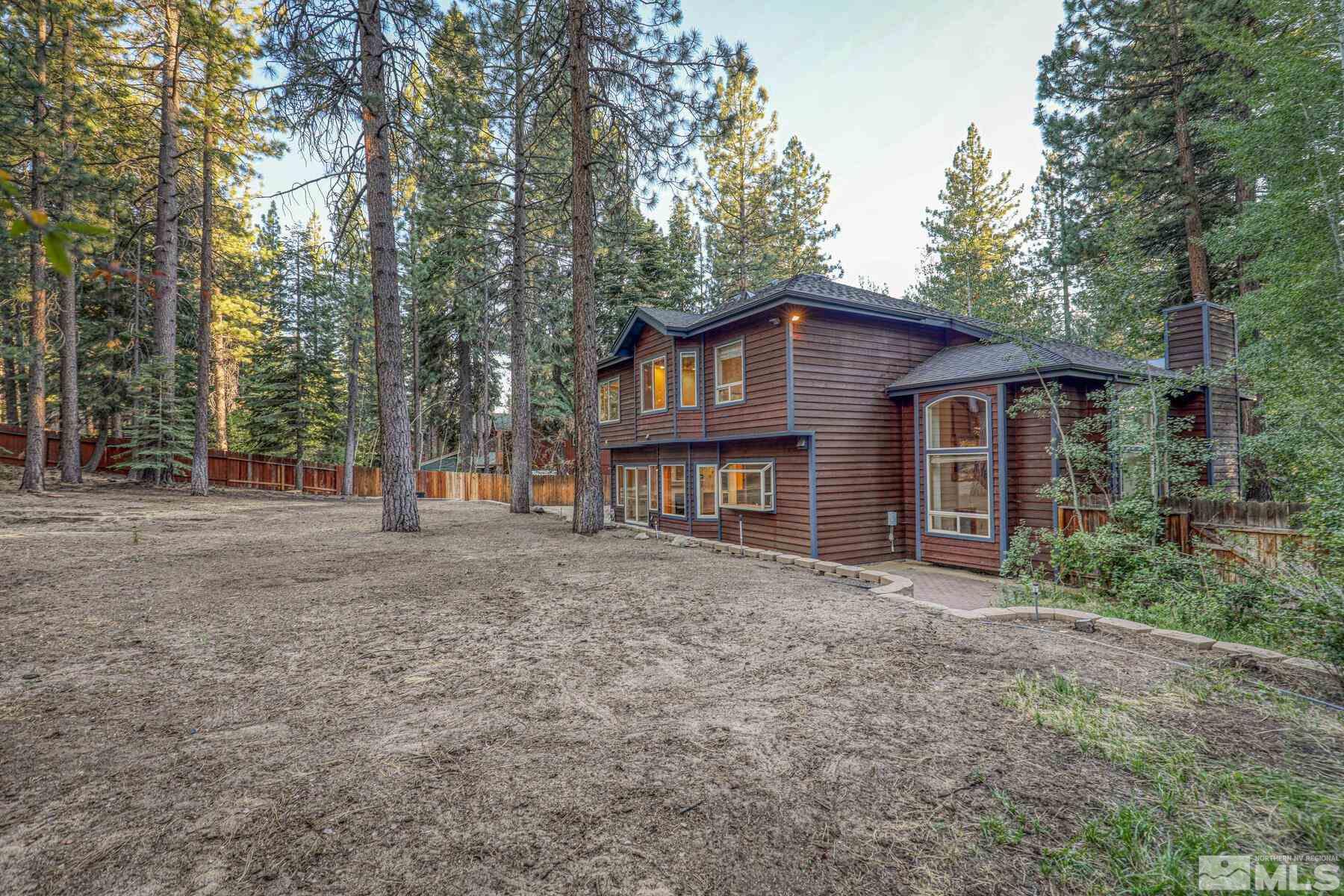 119 Meadow Drive Stateline, NV 89449 - Photo 7 of 30 a view of a house with large trees and large trees