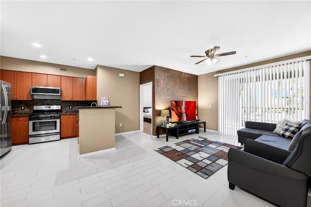 1801 East Katella Avenue, Unit 2139 Anaheim, CA 92805 - Photo 3 of 36 Living to Kitchen