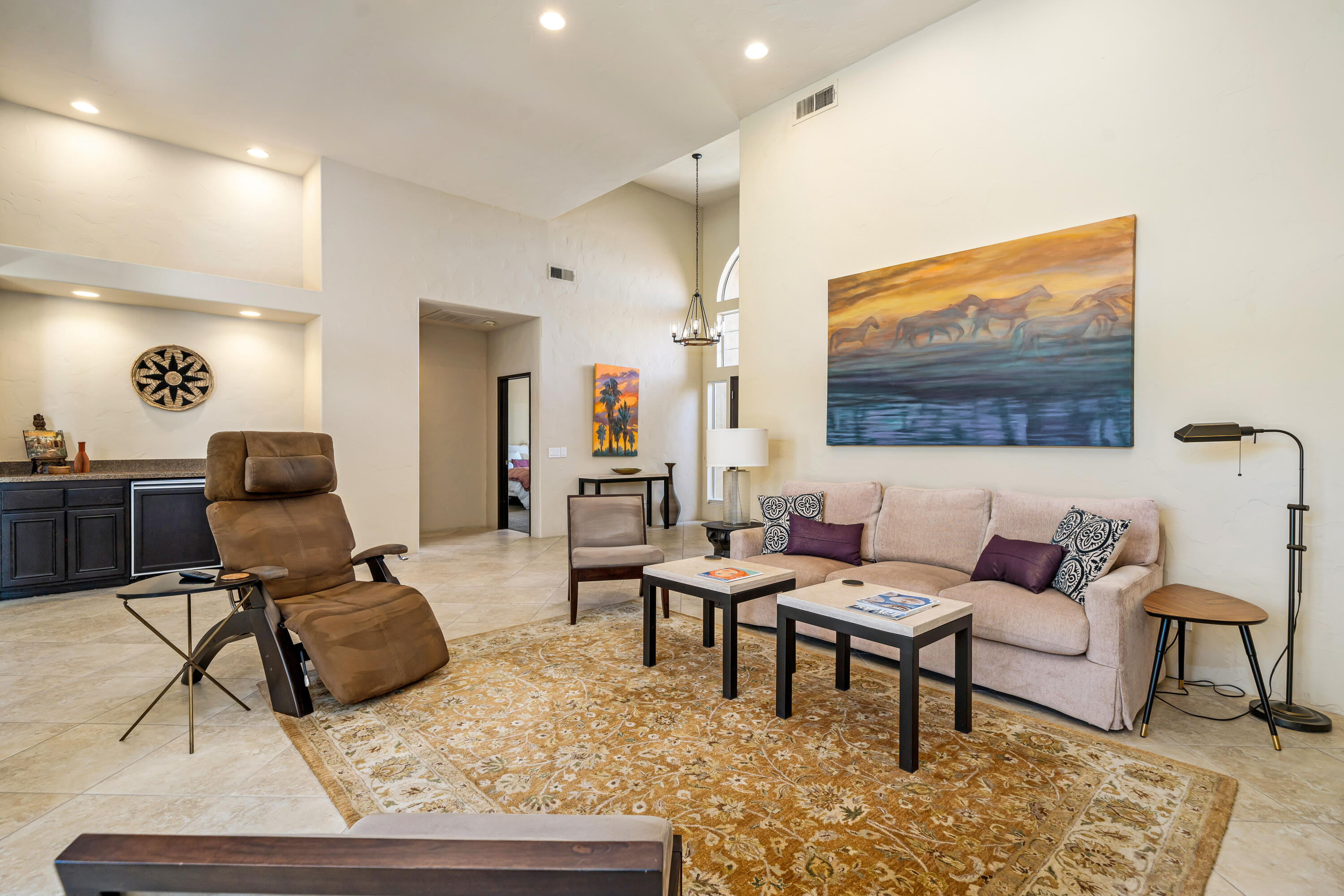 56565 Riviera La Quinta, CA 92253 - Photo 15 of 48 a living room with furniture and a flat screen tv