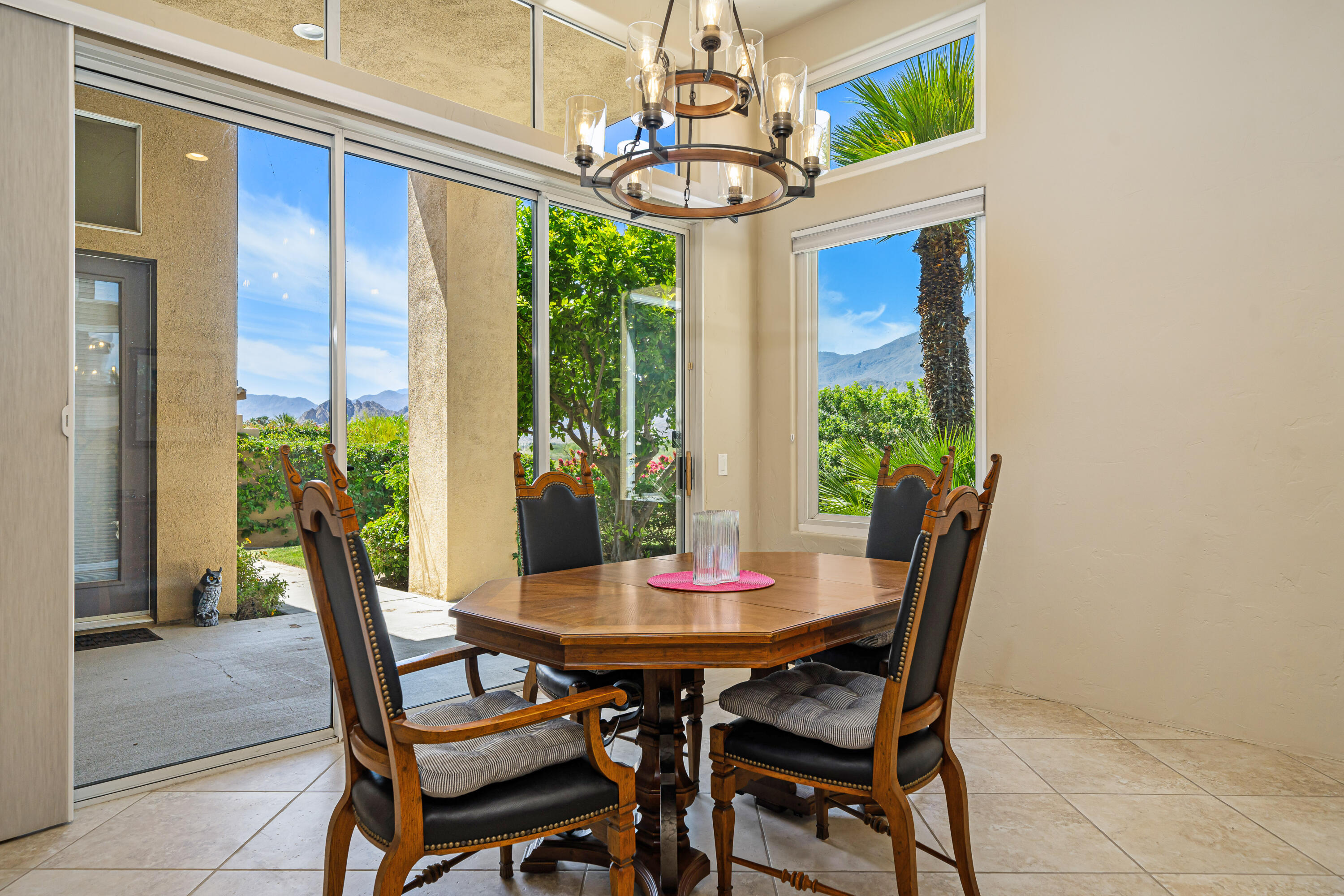 56565 Riviera La Quinta, CA 92253 - Photo 20 of 48 a view of a dining room with furniture window and outside view