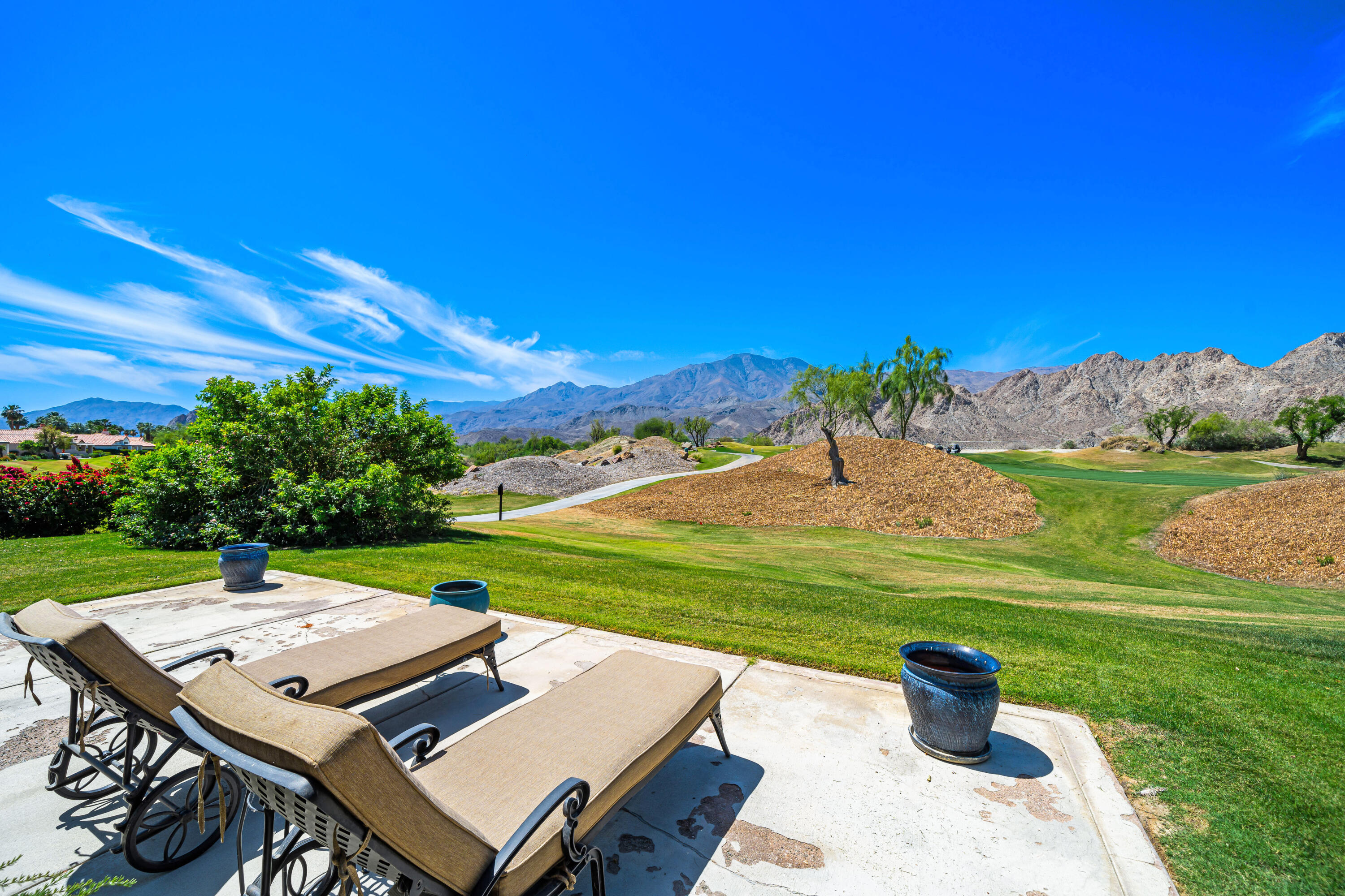 56565 Riviera La Quinta, CA 92253 - Photo 2 of 48 a view of a patio with a yard