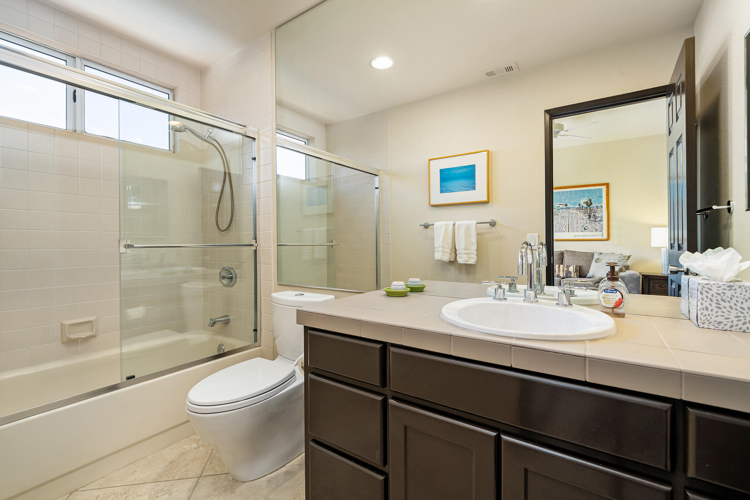 56565 Riviera La Quinta, CA 92253 - Photo 42 of 48 a bathroom with a sink a toilet and shower