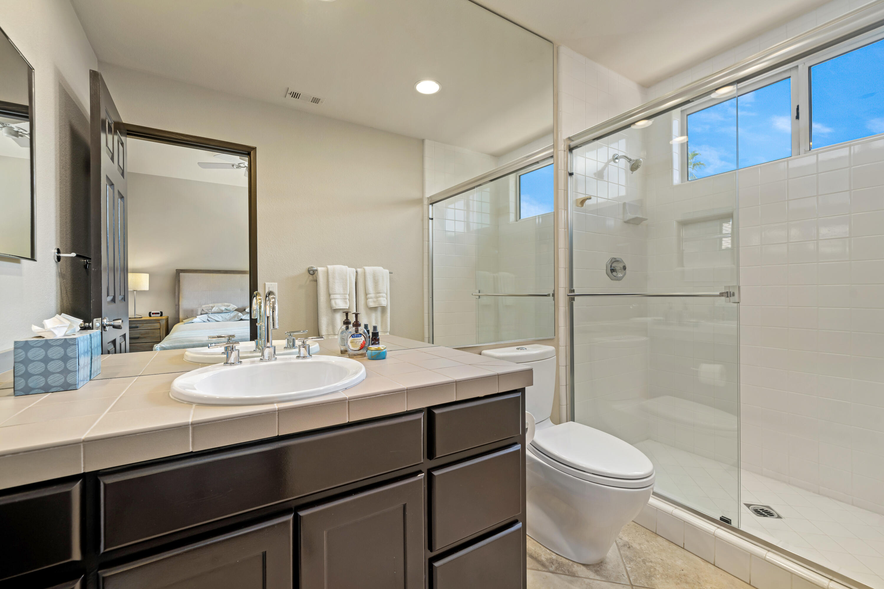 56565 Riviera La Quinta, CA 92253 - Photo 44 of 48 a bathroom with a sink a toilet and shower