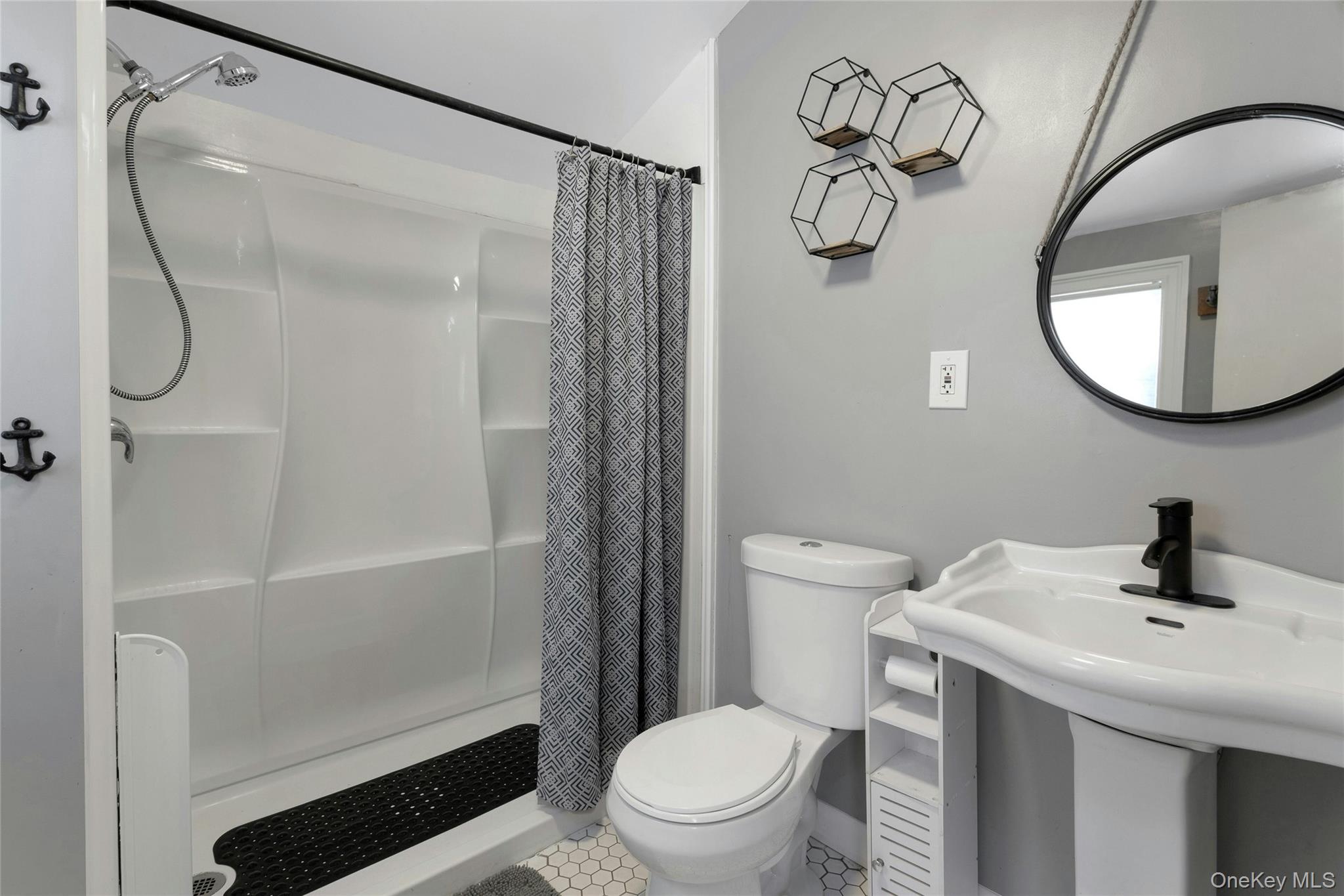 14 Dover Furnace Road Dover Plains, NY 12522 - Photo 17 of 22 a bathroom with a sink a toilet and shower
