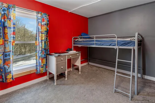 a room with furniture and air hockey table