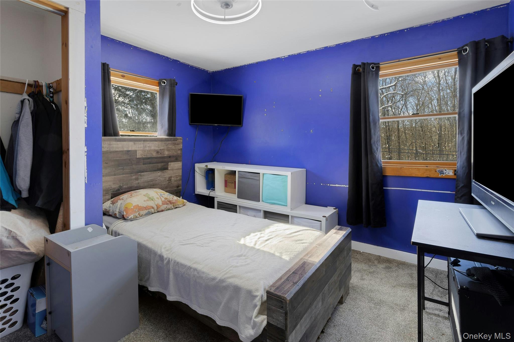 14 Dover Furnace Road Dover Plains, NY 12522 - Photo 22 of 22 a bedroom with a bed and a flat screen tv