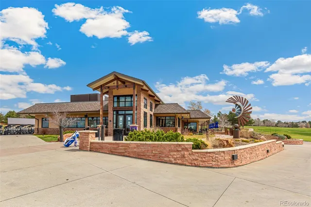 a view of outdoor space with signage and flags