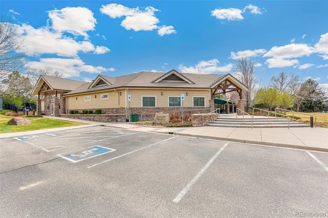 a view of a playground with basketball court