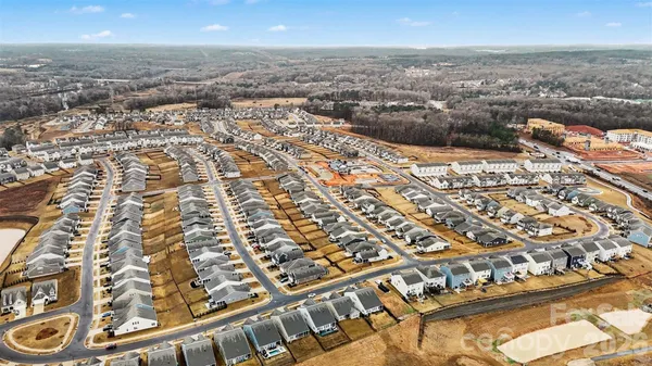 an aerial view of residential building with parking space