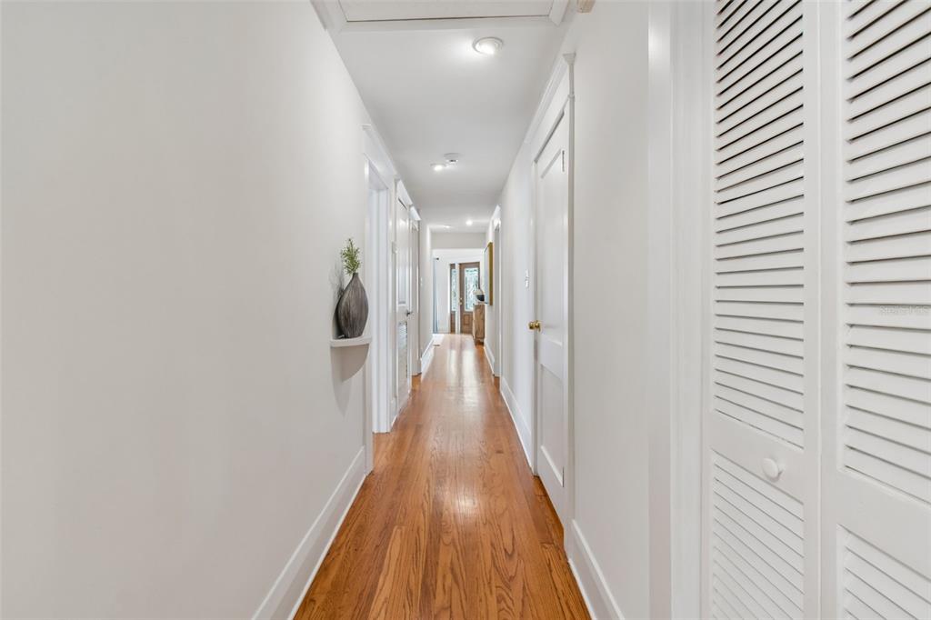 2434 West Prospect Road Tampa, FL 33629 - Photo 18 of 45 a view of a hallway with wooden floor