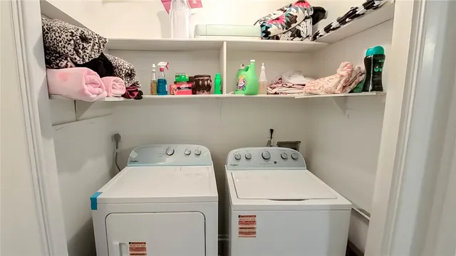 a utility room with dryer and washer